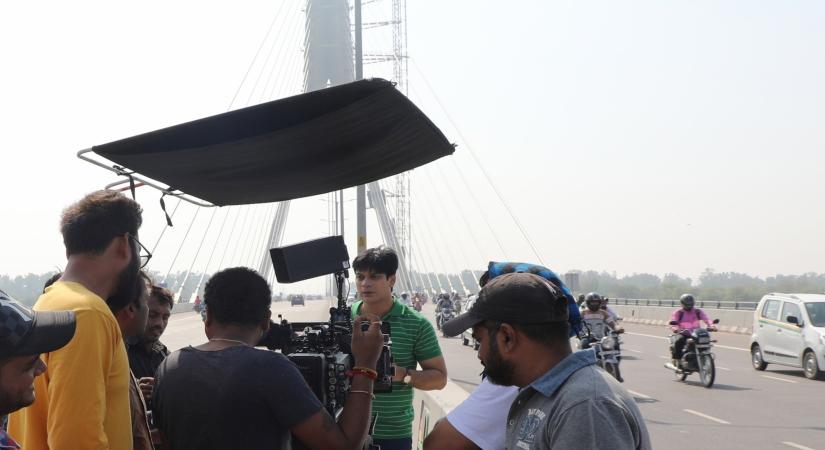 New Delhi: Actor Imran Zahid shoots for his upcoming film "Marksheet" at the Signature bridge in New Delhi on May 20, 2019. (Photo: IANS)
