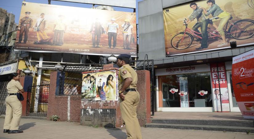 Mumbai: Security beefed-up outside a Mumbai theatre in the wake of country-wide protests against the Aamir Khan starrer film `PK` in Mumbai, on Dec 31, 2014. (Photo: Sandeep Mahankal/IANS)