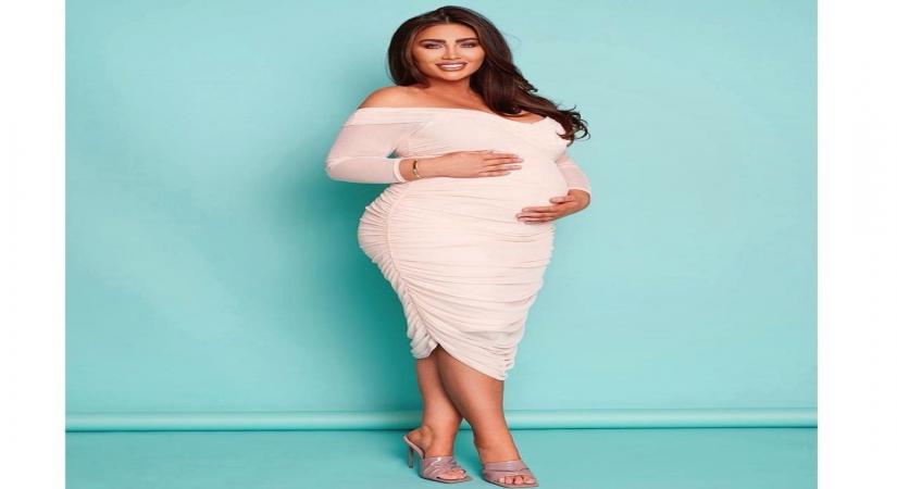 Actress Lauren Goodger, who recently announced her pregnancy, lashed out at cyber bullies who said that her baby bump was fake