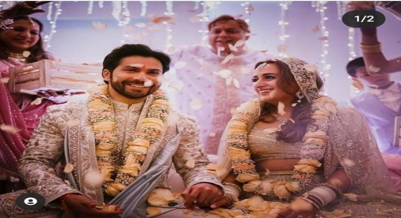 Varun Dhawan shares first image of wedding with Natasha Dalal .