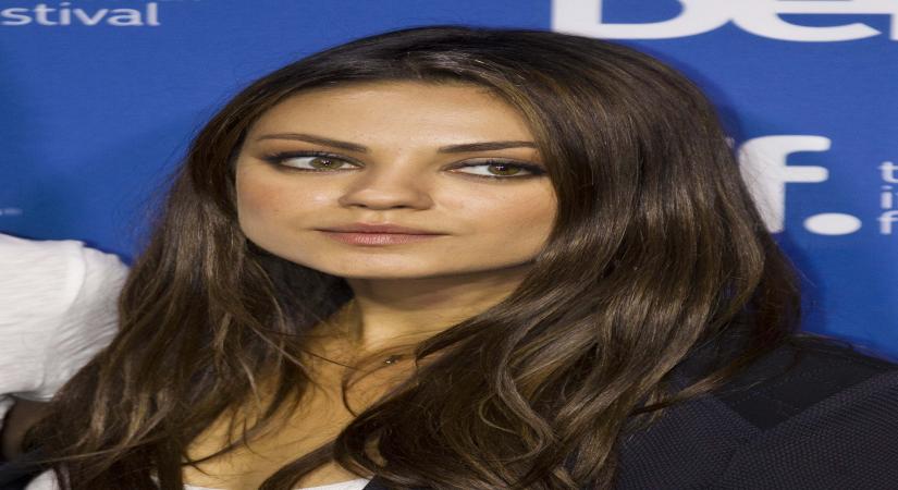 TORONTO, Sept. 11, 2013 (Xinhua) -- Actress Mila Kunis attends the press conference of the film "The Third Person" during the 38th Toronto International Film Festival in Toronto, Canada, Sept. 10, 2013. (Xinhua/Zou Zheng) (axy)