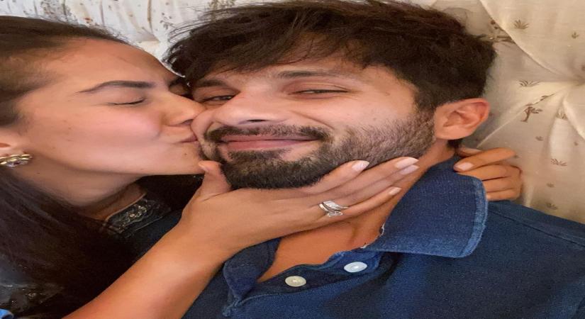 Actor Shahid Kapoor on Friday posted a picture with wife Mira Rajput kissing on the cheek, and the fans are not surprisingly gushing.