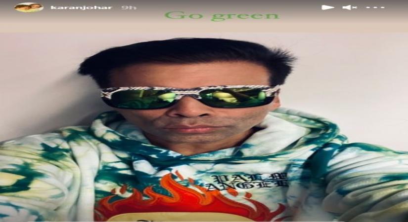 Filmmaker Karan Johar has urged all to go green in his latest post on social media. In an Instagram Story image, Johar poses in a green tie-dye sweatshirt and green sunglasses to put across his message.