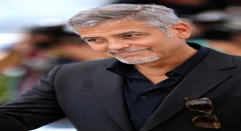 CANNES, May 12, 2016 (Xinhua) -- Cast member George Clooney poses during a photocall for the film "Money Monster" during the 69th Cannes Film Festival in Cannes, France, May 12, 2016. (Xinhua/Jin Yu/IANS)