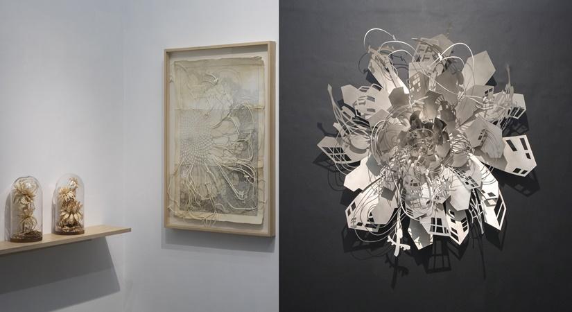 (L) Hand cut paper and drawings. (R) Stainless Steel, lights and consequences.
