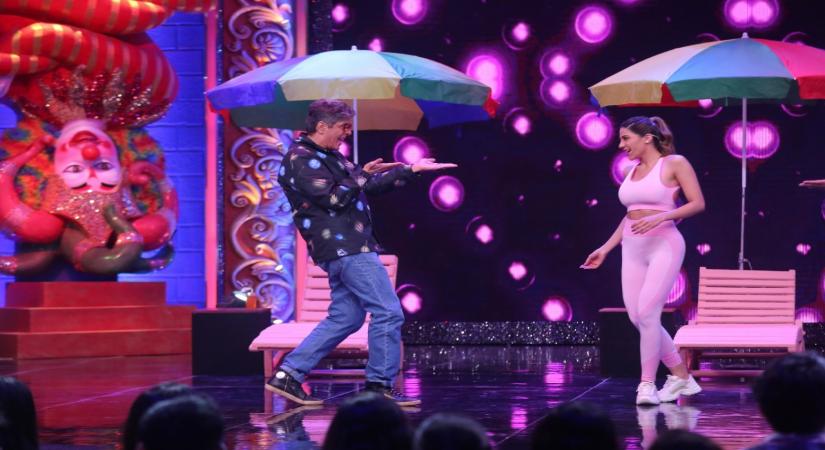 Nikki Tamboli says she's a fan of Chunky as she shakes a leg with him.