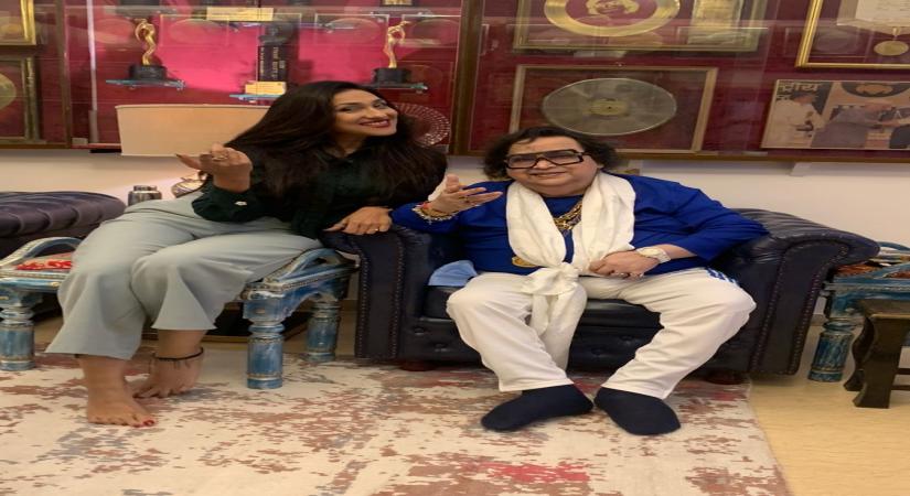 Bappi Lahiri records song with Rituparna Sengupta for Durga Puja.