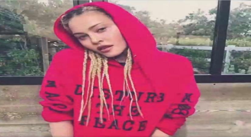 Madonna takes to Harlem street singing 'Like A Prayer'.