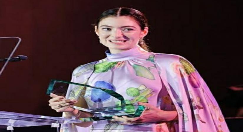 Lorde Lauds 'Golden Microphone' amplifying her voice to fight climate change.