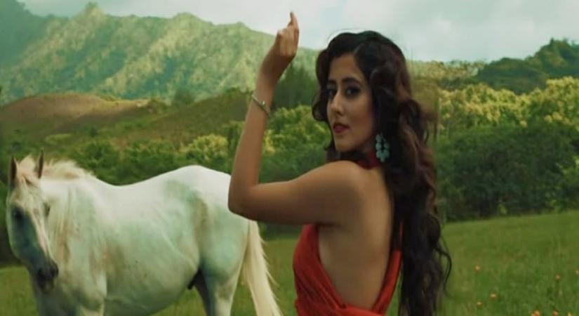 Jonita Gandhi's new Punjabi single 'Chal Koi Na' playing now.