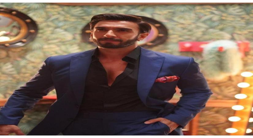 Ranveer Singh recalls impressing Deepika during 'Lungi Dance' shoot.
