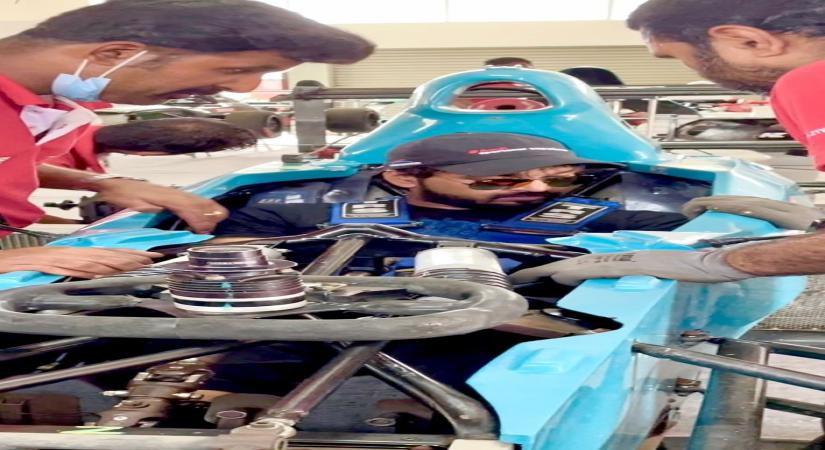 Actor Jai in his race car