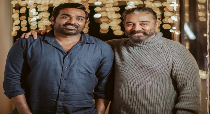 Kamal Haasan greets Vijay Sethupathi.