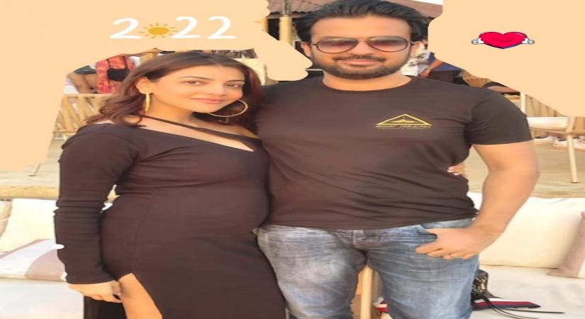 Kajal Aggarwal shows off her growing baby bump.