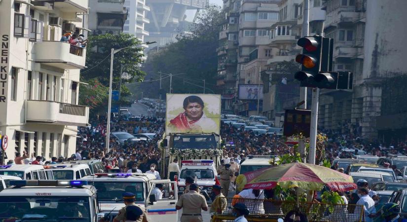 Mumbai :The body of Lata Mangeshkar, is taken for funeral procession outside her house in Mumbai, on Sunday, Feb.6, 2022.(Photo: Nitin Lawate/IANS)