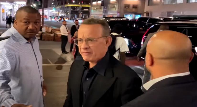 Tom Hanks yells at fans after they cause wife Rita to trip