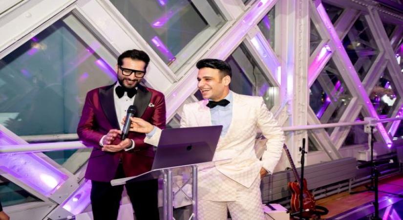 Comedian Nitinn R Miranni  leads to the group to sing the National Anthem on the eve of celebrations