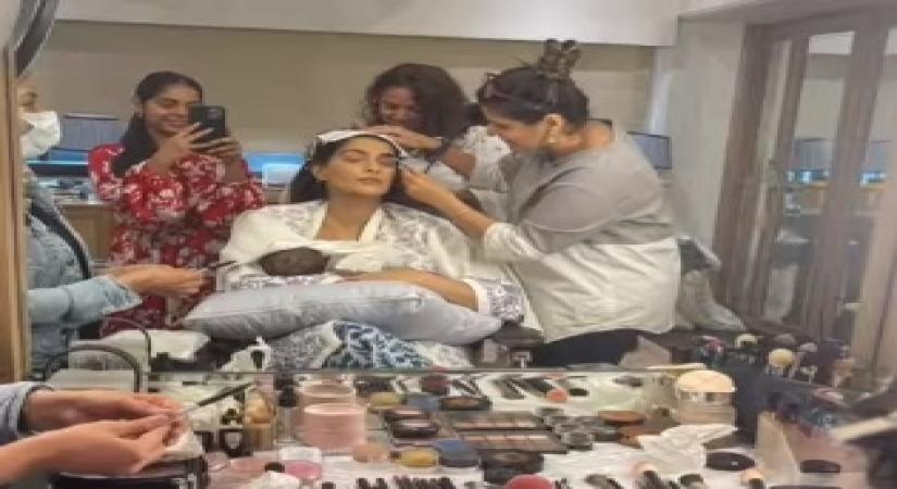 Sonam breastfeeds son while getting f makeup done