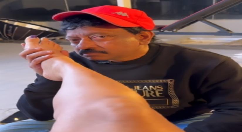 RGV licks, kisses actress Ashu Reddy's feet, video goes viral