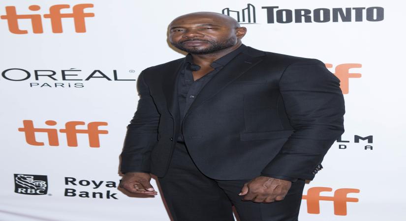 TORONTO, Sept. 9, 2016 (Xinhua) -- Director Antoine Fuqua poses for photos before the "The Magnificent Seven" premiere during the 41st Toronto International Film Festival (TIFF) in Toronto, Canada, Sept. 8, 2016. (Xinhua/Zou Zheng/IANS) (djj)