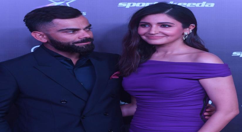 Mumbai:Indian Cricketer Virat Kohli with his wife and actress Anushka Sharma pose during Indian sports honours award in mumbai on thursday March 23,2023.(Photo:IANS)