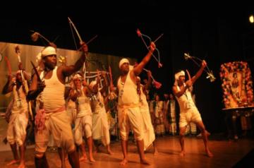 Kolkata: Tribal artistes perform during "Hul Utsav" - a tribal festival in Kolkata, on June 30, 