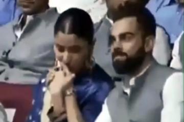 A soft kiss planted on India skipper Virat Kohli's hand by his actress wife Anushka Sharma has taken the Internet by storm. The two were present at the event where the Feroz Shah Kotla Stadium was rechristened after former Finance Minister Arun Jaitley and a special stand dedicated to Kohli.