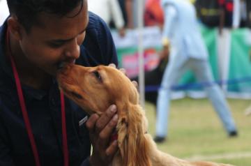 Kolkata: A man with his pet at a dog show organised by Calcutta Canine Club in Kolkata, on Dec 15, 2018. (Photo: IANS)