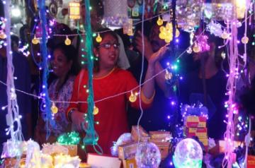 People busy buying electric fancy lights ahead of Diwali - festival of light in Kolkata on Oct 20, 2019. (Photo: Kuntal Chakrabarty/IANS)