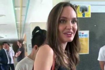 An emotional Angelina Jolie tried "not to cry" while dropping off son Maddox to college in South Korea. The 18-year-old is attending Yonsei University in South Korea to study biochemistry, and Jolie dropped him off at the school in-person.