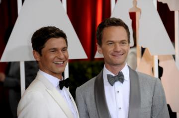 LOS ANGELES, Feb 23, 2015 (Xinhua) -- The host Neil Patrick Harris (R) with his lover arrives for the red carpet of the 87th Academy Awards at the Dolby Theater in Los Angeles, the United States, on Feb 22, 2015. (Xinhua/Yang Lei/IANS)(wxl)