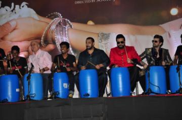 Mumbai: Actors Anupam Kher, Salman Khan, Arman Kohli and Neil Nitin Mukesh celebrate Diwali with Dharavi Rocks, a band of kids who make music out of waste materials in Mumbai on Nov 11, 2015. (Photo: IANS)