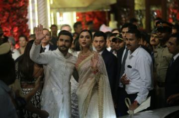 Mumbai: Actors Deepika Padukone and Ranveer Singh at the wedding ceremony of industrialist Mukesh Ambani's daughter Isha Ambani and Anand Piramal at Antilia in Mumbai on Dec 12, 2018. (Photo: IANS)