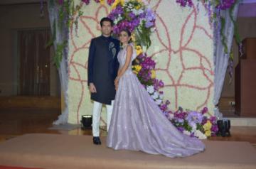 Mumbai: Filmmaker Sooraj Barjatya's son Devaansh Barjatya and his wife Nandini at their wedding reception in Mumbai on Nov 29, 2019. (Photo: IANS)
