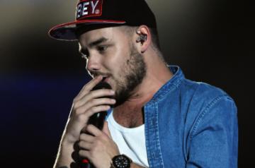 MONTEVIDEO, May 7, 2014 (Xinhua) -- Liam Payne, member of British band One Direction, performs during a concert of their "Where we are" tour, in the Centenario Stadium, in Montevideo, capital of Uruguay, on May 6, 2014. (Xinhua/Nicolas Celaya/IANS)
