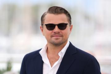 CANNES, May 22, 2019 (Xinhua) -- Actor Leonardo DiCaprio poses during a photocall for "Once Upon a Time in Hollywood" during the 72nd Cannes Film Festival in Cannes, France, May 22, 2019. "Once Upon a Time in Hollywood" will compete for the Palme d'Or with 20 other films. (Xinhua/Gao Jing/IANS)