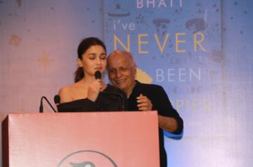 Actress Alia Bhatt accompanied by her father Mahesh Bhatt, addresses at the launch of her sister Shaheen Bhatt's book "I've Never Been (un)Happier" in Mumbai on Dec 4, 2019. (Photo: IANS)