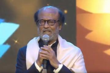 Panaji: Actor Rajinikanth addresses after receiving the "Icon of the Golden Jubilee" Award during the 50th International Film Festival of India (IFFI-2019) in Panaji, Goa on Nov 20, 2019. (Photo: IANS/PIB)