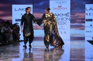Actors Bipasha Basu and Karan Singh Grover walks the ramp on Lakme Fashion Week Day 4, in Mumbai 