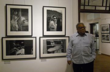Photographer Nemai Ghosh exhibiting his work "Satyajit Ray and
Beyond" presented by the Delhi Art Gallery in Kolkata on August 16, 2013.
Nemai Ghosh is best known as Satyajit Ray's photographer. (Photo::: IANS)