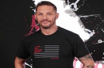 Tom Hardy puts safety first during grocery shopping .