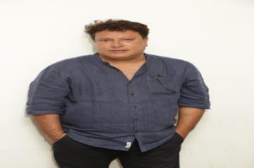 Noida: Director Tigmanshu Dhulia during an interaction programme ahead of the release of his upcoming film "Milan Talkies" at IANS office, in Noida, on March 13, 2019. (Photo: IANS)