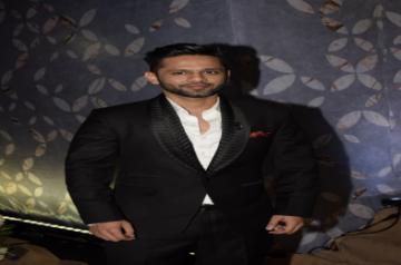 Indian Singer Rahul Vaidya arrives to attend NCP leader Praful Patel's daughter Poorna Patel's wedding reception, in Mumbai, on July 22, 2018. (Photo: IANS)