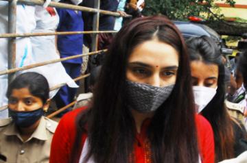 Bengaluru: Sandalwood actresses Ragini Dwivedi and Sanjjanaa Galrani, arrested in the drugs racket case, come out of the KC General Hospital, after undergoing medical tests, in Bengaluru on Sep 14, 2020. Both actresses were arrested in a case related to alleged links of the drug mafia with Kannada film industry actors. (Photo: IANS)