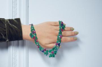 'Tutti Frutti' style gem-set wreath of rubies, emerald and sapphires.