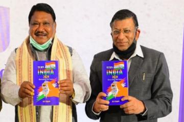 (L-R) Hon’bl Shri Jual Oram, M.P. & Chairperson Standing Committee on Defence, Government of India with Mr. R.P. Gupta Launching the Book