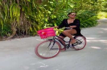 Bollywood actress Bipasha Basu says she loves cycling. The actress has posted a video that sees her cycling in Maldives. In the Instagram clip, she rides her wheels in a black bikini paired with a hot pink bottom and a black cover up