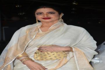 Rekha gifts Neha Kakkar Kanjivaram saree as wedding gift