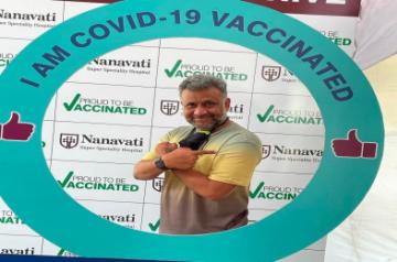 Anubhav Sinha takes vaccine for COVID-19 prevention.