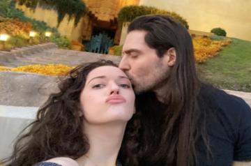 Kat Dennings, Andrew WK share a passionate kiss in new pic